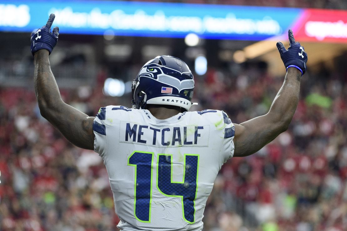 GLENDALE, ARIZONA - SEPTEMBER 29: Wide receiver D.K. Metcalf #14 of the Seattle Seahawks celebrates a touchdown that was scored in the second half of the NFL game against the Arizona Cardinals at State Farm Stadium on September 29, 2019 in Glendale, Arizona. The Seattle Seahawks won 27-10. (Photo by Jennifer Stewart/Getty Images)