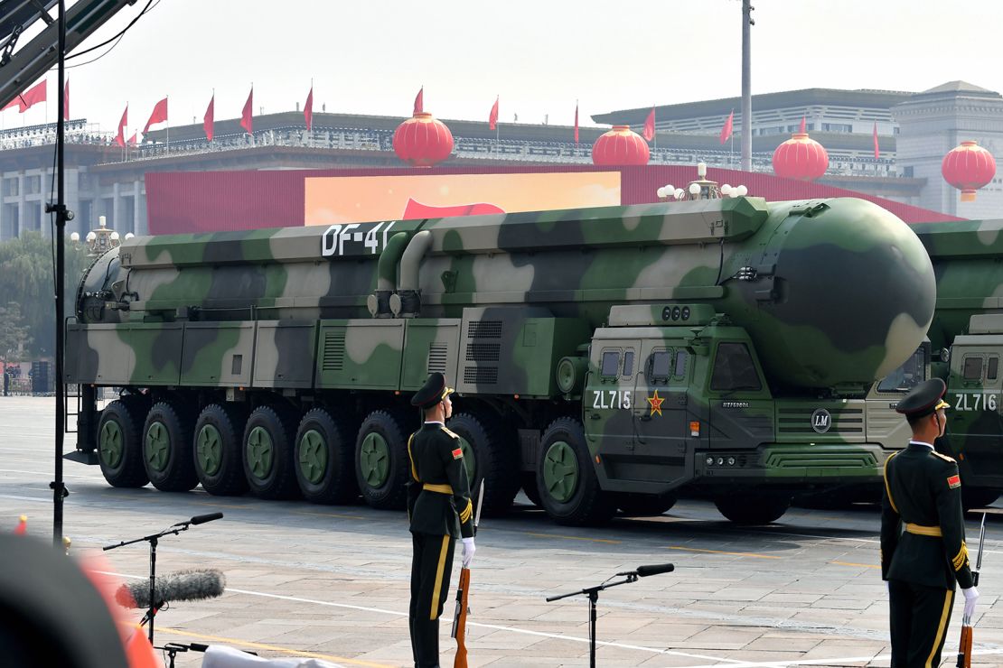 Military vehicles carrying DF-41 intercontinental ballistic missiles appear in a parade in Beijing on October 1, 2019.