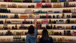Women look at cosmetic products on display at the plant of Brazilian cosmetics company Natura, in Cajamar, some 43 km from Sao Paulo, Brazil on August 26, 2019. - Brazilian Natura is about to become the fourth largest cosmetics company in the world, with an image of respect to biodiversity and to beauty styles which are "free of stereotypes", its CEO assured. (Photo by NELSON ALMEIDA / AFP) (Photo by NELSON ALMEIDA/AFP via Getty Images)