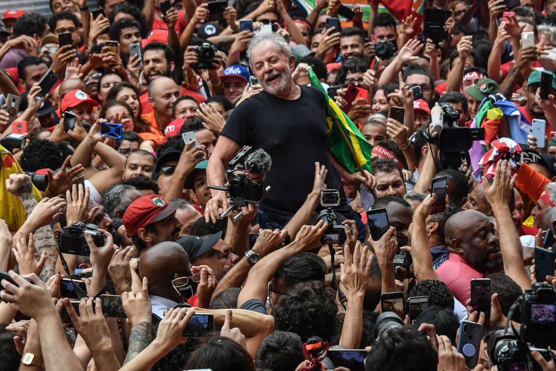 Brazilian former president (2003-2011) Luiz Inacio Lula da Silva is carried on the shoulders through the crowd of supporters after being freed following a year and a half behind bars for corruption.