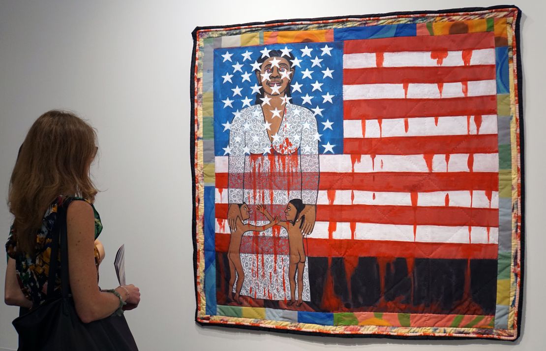 Ringgold's 1997 work "The Flag is Bleeding #2," on display during a preview at Art Basel on December 4, 2019, in Miami Beach, Florida.