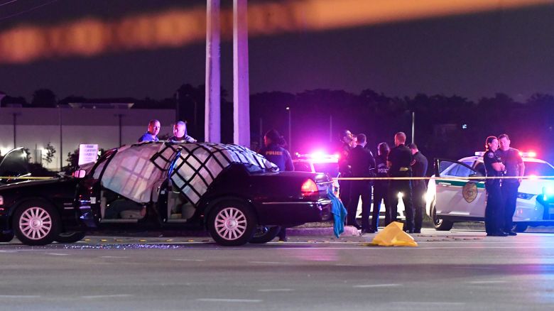 Police work the scene at the intersection of Miramar Parkway and Flamingo Road in Miramar, Florida, after a deadly shootout on December 5, 2019.