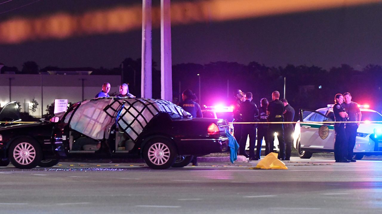 Police work the scene at the intersection of Miramar Parkway and Flamingo Road in Miramar, Florida, after a deadly shootout on December 5, 2019.