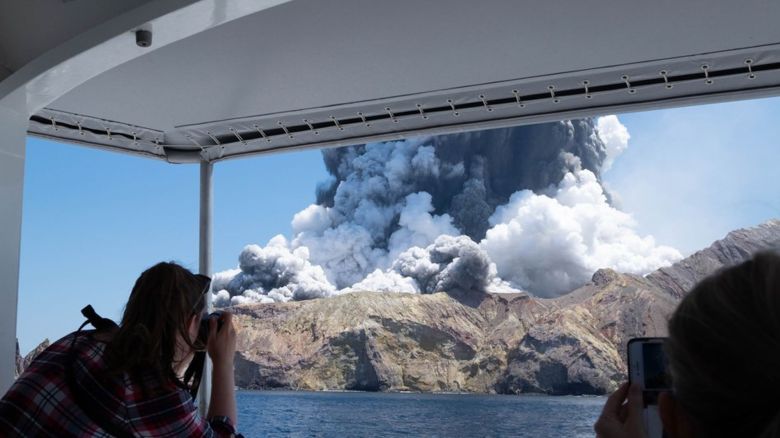 WHITE ISLAND NEW ZEALAND, Dec. 10, 2019 -- A person takes photos of volcanic eruption at New Zealand's White Island, Dec. 9, 2019. Five people were confirmed dead in a volcanic eruption in New Zealand's White Island in the Eastern Bay of Plenty of the North Island on Monday, with more casualties likely, the police said. (Photo by Michael Schade/Handout/Xinhua via Getty) (Xinhua/ via Getty Images)