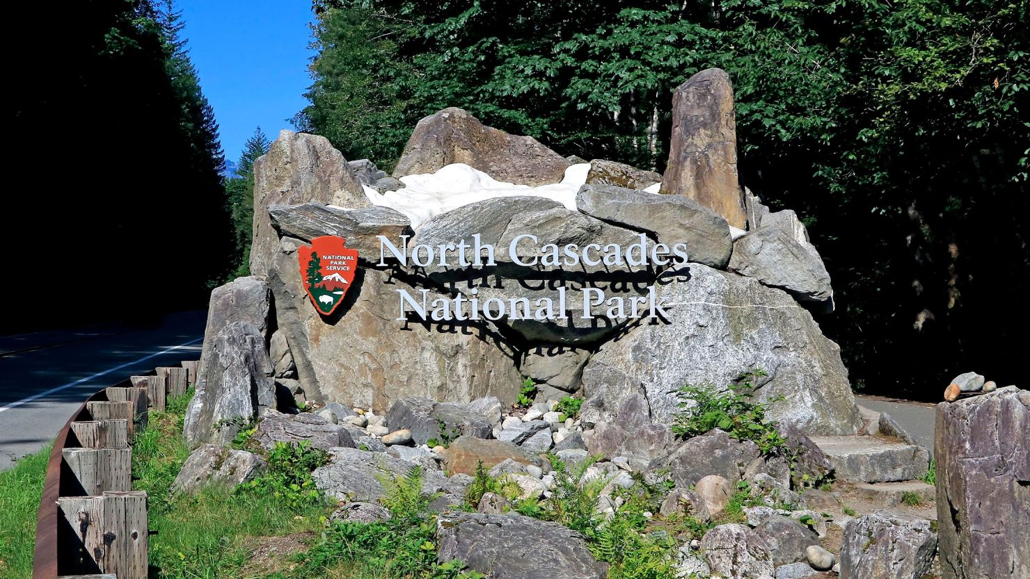 The west-side entry sign for North Cascades National Park on State Highway 20 in Washington is shown.