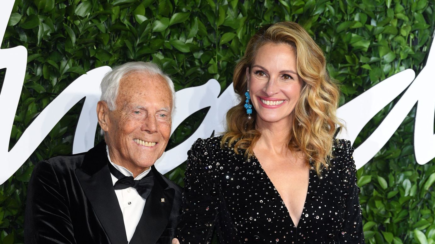 Giorgio Armani pictured in 2019 with Julia Roberts, who on Thursday described the late fashion designer as a "true friend" and "legend."