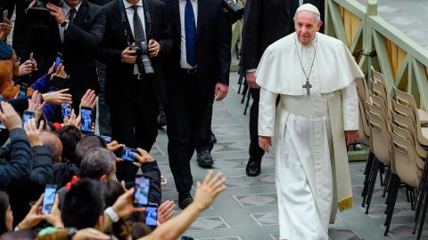 Pope Francis (R) goes to meet with attendees during the weekly general audience on January 22, 2020 at Paul-VI hall in the Vatican. (Photo by Filippo MONTEFORTE / AFP) (Photo by FILIPPO MONTEFORTE/AFP via Getty Images)