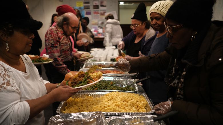 NEW YORK, NEW YORK - DECEMBER 21: New Yorkers, many of them homeless or formally homeless, attend a service and dinner at Judson Memorial Church on National Homeless Persons' Memorial Day on December 21, 2019 in New York City. The annual interfaith service, which is held on the Winter solstice, is organized by the homeless advocacy group Picture the Homeless, a grassroots organization founded and led by homeless people. The service attempts to raise awareness of homelessness and to honor those homeless men and women who ed away during the year. According to Coalition for the Homeless, in New York City over 63,000 homeless men, women, and children are sleeping each night in municipal homeless shelters. (Photo by Spencer Platt/Getty Images)