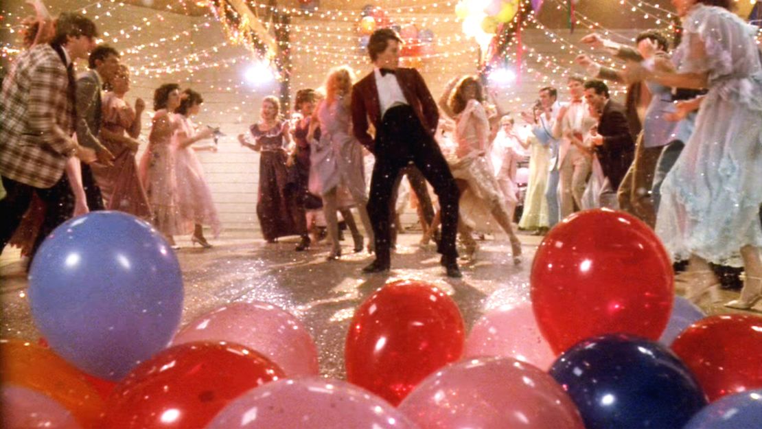 The movie "Footloose", directed by Herbert Ross and written by Dean Pitchford. Seen here in center, Kevin Bacon as Ren.