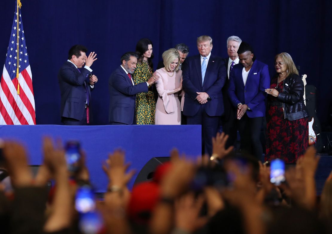 Faith leaders pray over President Donald Trump during an "Evangelicals for Trump'"campaign event on January 3, 2020, in Miami, Florida.