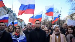 TOPSHOT - Russian opposition leader Alexei Navalny, his wife Yulia, opposition politician Lyubov Sobol and other demonstrators march in memory of murdered Kremlin critic Boris Nemtsov in downtown Moscow on February 29, 2020. (Photo by Kirill KUDRYAVTSEV / AFP) (Photo by KIRILL KUDRYAVTSEV/AFP via Getty Images)