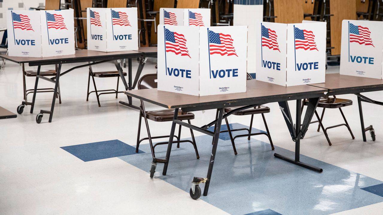 Voting booths sit empty midway through a day of primary elections in Arlington, Virginia, on March 3, 2020.