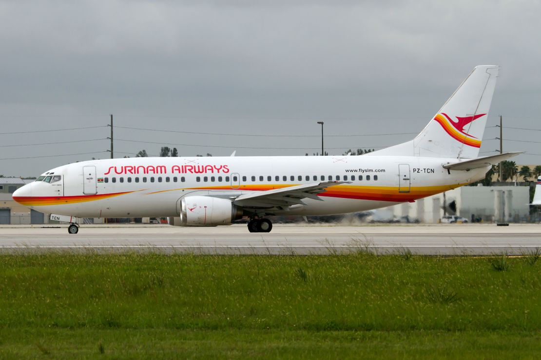 A Surinam Airways 737-300 prepares to depart Miami International.