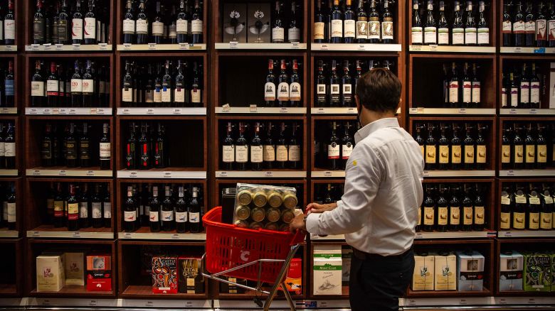 A customer browses wine at a supermarket in Bangkok, Thailand, on April 9, 2020.