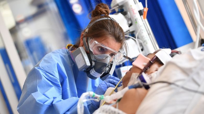 Staff care for a Covid-19 patient at the Intensive Care Unit at Royal Papworth Hospital on May 5, 2020 in Cambridge, England.