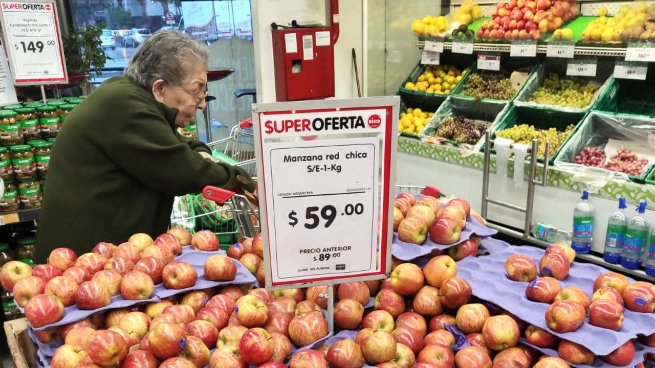 BUENOS AIRES, ARGENTINA - MARCH 18: A senior customer shops at a Disco Supermarket on March 18, 2020 in Buenos Aires, Argentina. As an emergency measure, some supermarkets decided to open one hour earlier and give exclusive access to people over 65, considered a group of risk amid the increasing cases of COVID-19. National Government also licensed public employees and encouraged seniors to stay at home. (Photo by Lalo Yasky/Getty Images)