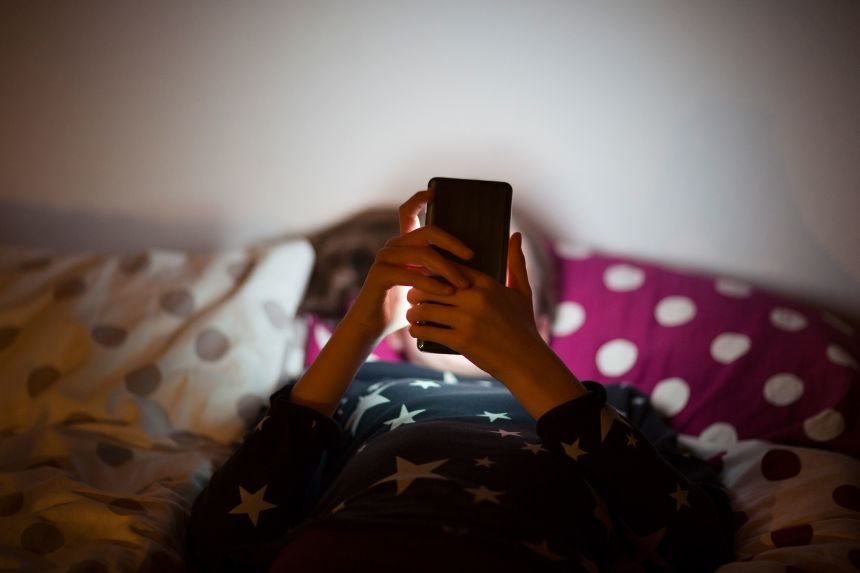 Kids who used smartphones before age 13 faced sleep disruptions, cyberbullying and negative family relationships, according to a new study.
