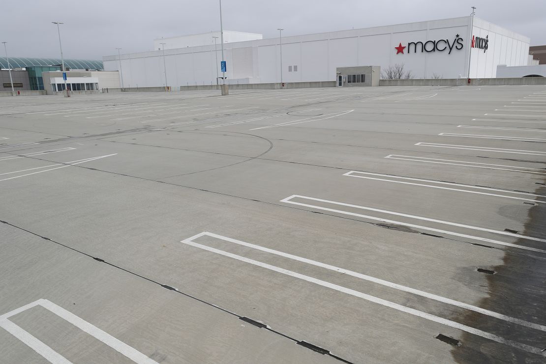 The empty parking lot outside a Macy's department store in March, 2020. Malls and some shopping centers closed temporarily, following New York State's mandate that the indoor portions of the malls be shut down amid the coronavirus pandemic.