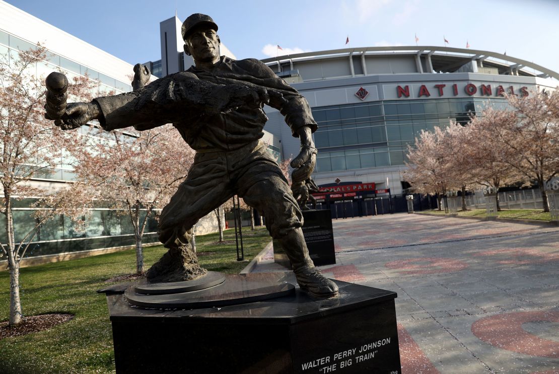 The statue of Walter Johnson stands outside Nationals Park.