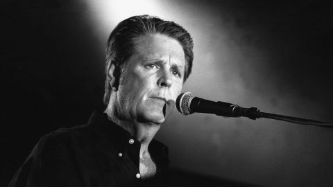 Musician Brian Wilson, best known as the leader and chief songwriter of the Beach Boys, is shown performing on stage during a "live" concert appearance on June 20, 1999.