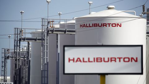 Halliburton Co. signage is displayed alongside storage tanks in Port Fourchon, Louisiana, U.S., on Thursday, June 11, 2020. Oil eclipsed $40 a barrel in New York on Friday, extending a slow but relentless rise thats been fueled by a pick-up in demand and could signal a reawakening for U.S. shale production. Photographer: Luke Sharrett/Bloomberg via Getty Images