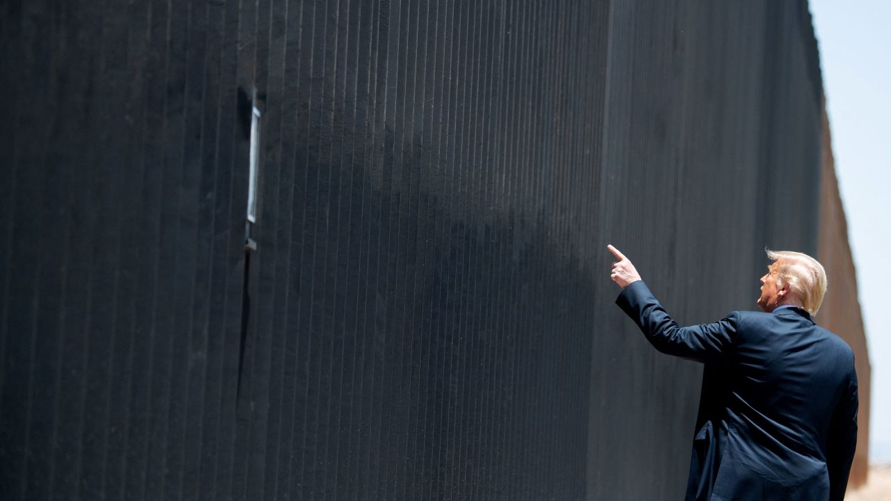 TOPSHOT - US President Donald Trump participates in a ceremony commemorating the 200th mile of border wall at the international border with Mexico in San Luis, Arizona, June 23, 2020. (Photo by SAUL LOEB / AFP) (Photo by SAUL LOEB/AFP via Getty Images)