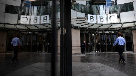 A man walks outside the BBC headquarters in London on July 2, 2020.