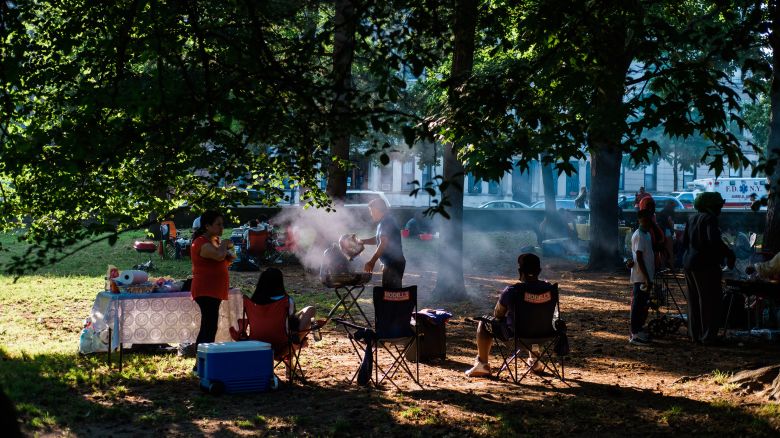People barbecue at Prospect Park in the Brooklyn borough of New York, on July 4, 2020.
