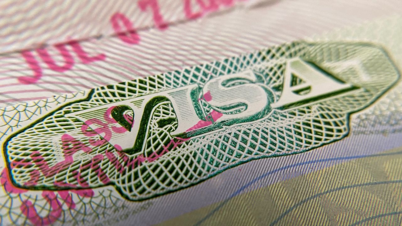 This photo illustration shows a visa stamp on a foreign passport in Los Angeles on June 6, 2020. - The United States said July 6 it would not allow foreign students to remain in the country if all of their classes are moved online in the fall over the coronavirus crisis. (Photo by Chris DELMAS / AFP) (Photo by CHRIS DELMAS/AFP via Getty Images)