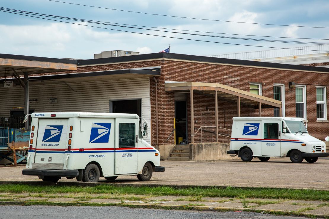 United States Postal Service delivery vehicles are parked at the Sunbury, Pennsylvania, Post Office.