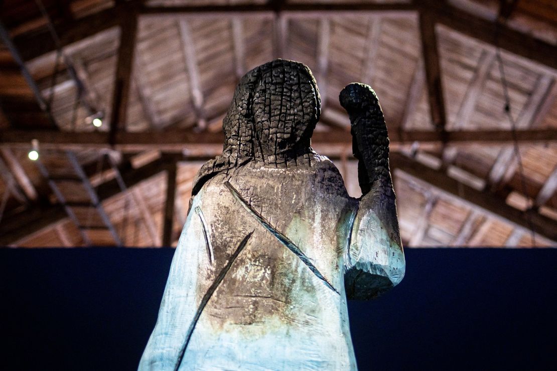A picture taken in September 2020 shows the original wooden statue after it was set on fire.