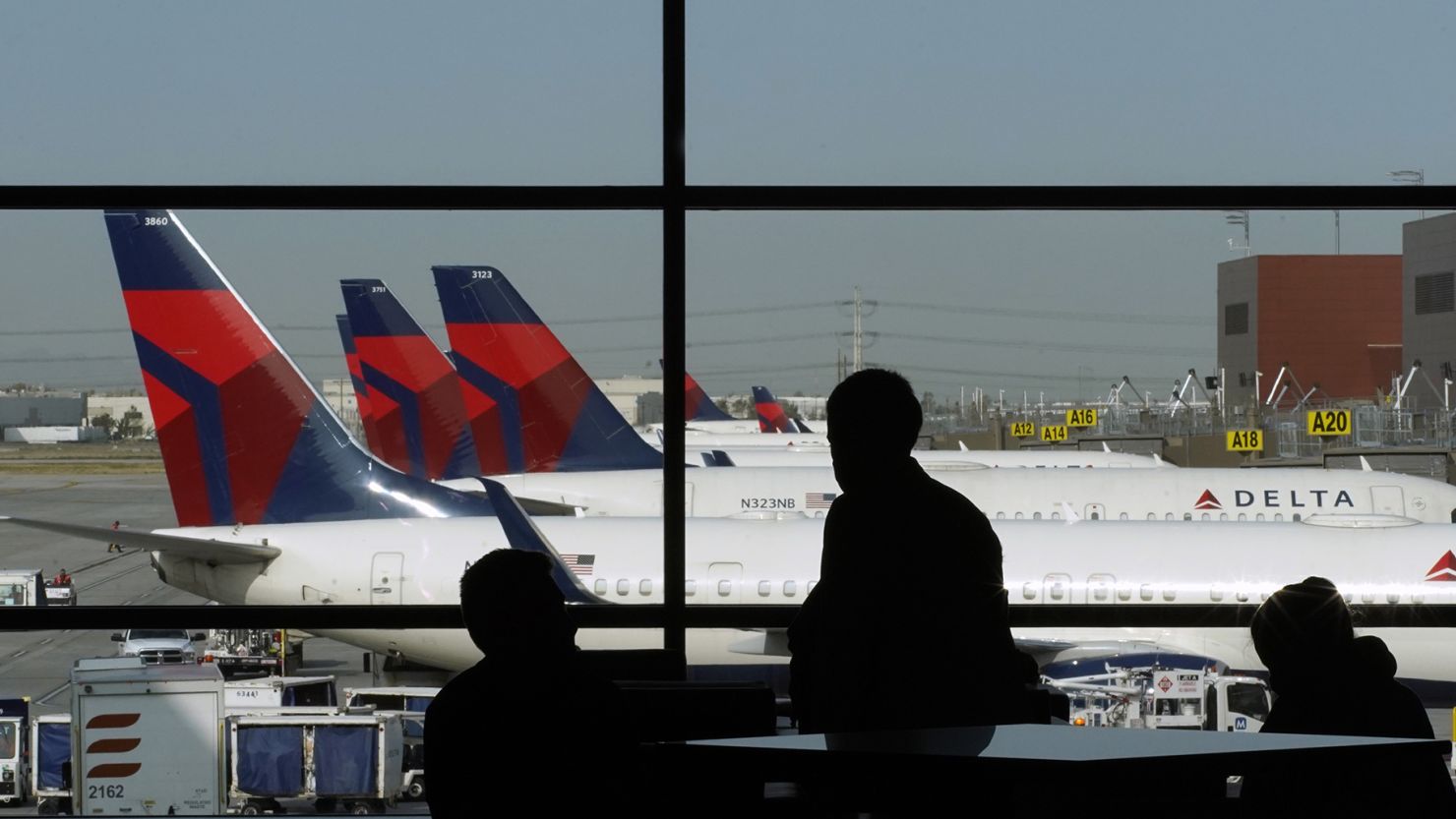 Delta Air Lines planes sit at gates at Salt Lake City International Airport in a 2020 file photo.