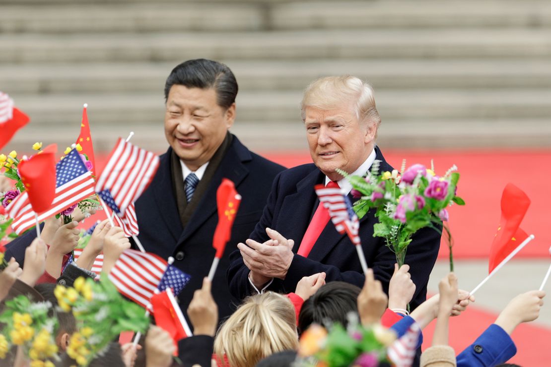 Donald Trump and Chinese leader Xi Jinping attend a welcome ceremony outside the Great Hall of the People in Beijing in 2017.