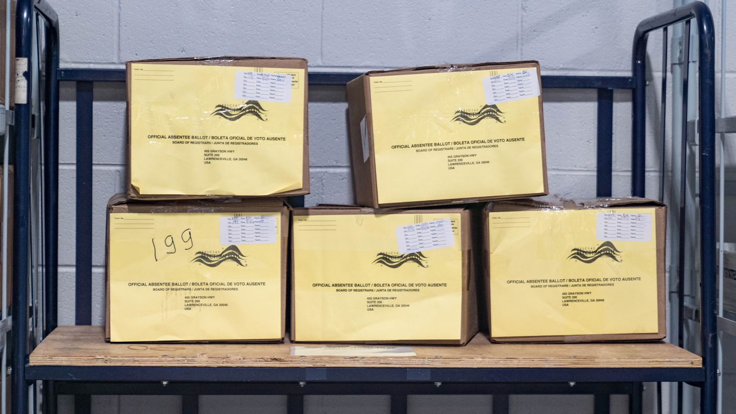 Boxes of ballots are seen as Gwinnett County election workers handle ballots as part of the recount for the 2020 presidential election at the Beauty P. Baldwin Voter Registrations and Elections Building on November 16, 2020 in Lawrenceville, Georgia.