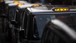 A queue of black cabs outside Victoria Station in London in November 2020.