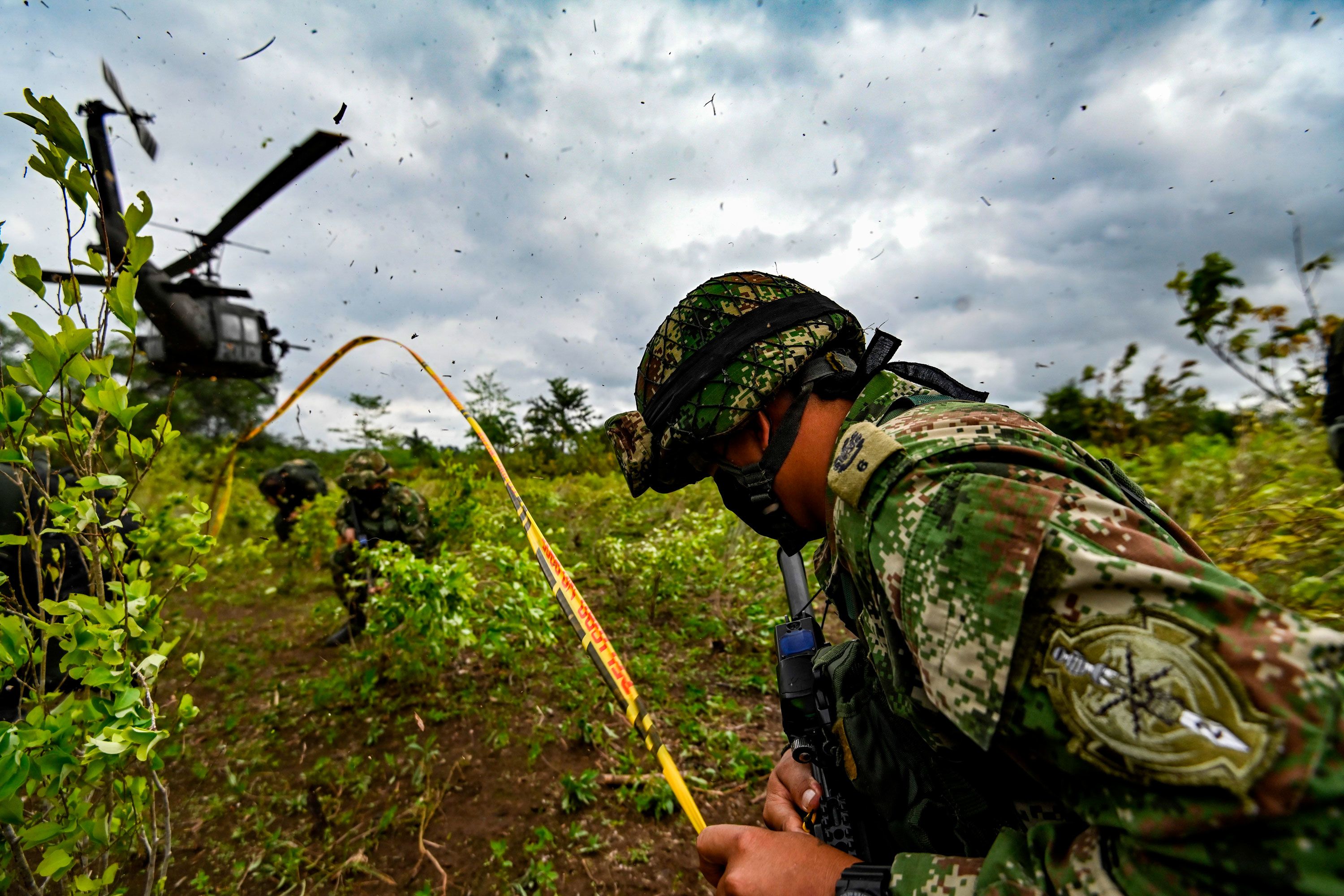 Colombian soldiers take part in an operation to eradicate illicit crops in Tumaco, Narino Department, Colombia on December 30, 2020.