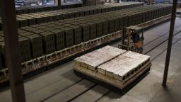 A worker uses a forklift to carry refractory bricks at the Bowerston Shale Co. facility in Hanover, Ohio, on January 7, 2021.