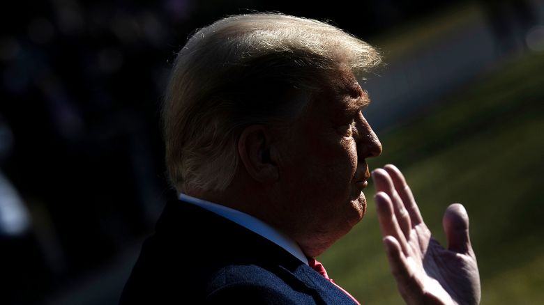 TOPSHOT - US President Donald Trump walks to Marine One on the South Lawn of the White House on January 12, 2021 in Washington,DC before his departure to Alamo, Texas. (Photo by Brendan Smialowski / AFP) (Photo by BRENDAN SMIALOWSKI/AFP via Getty Images)