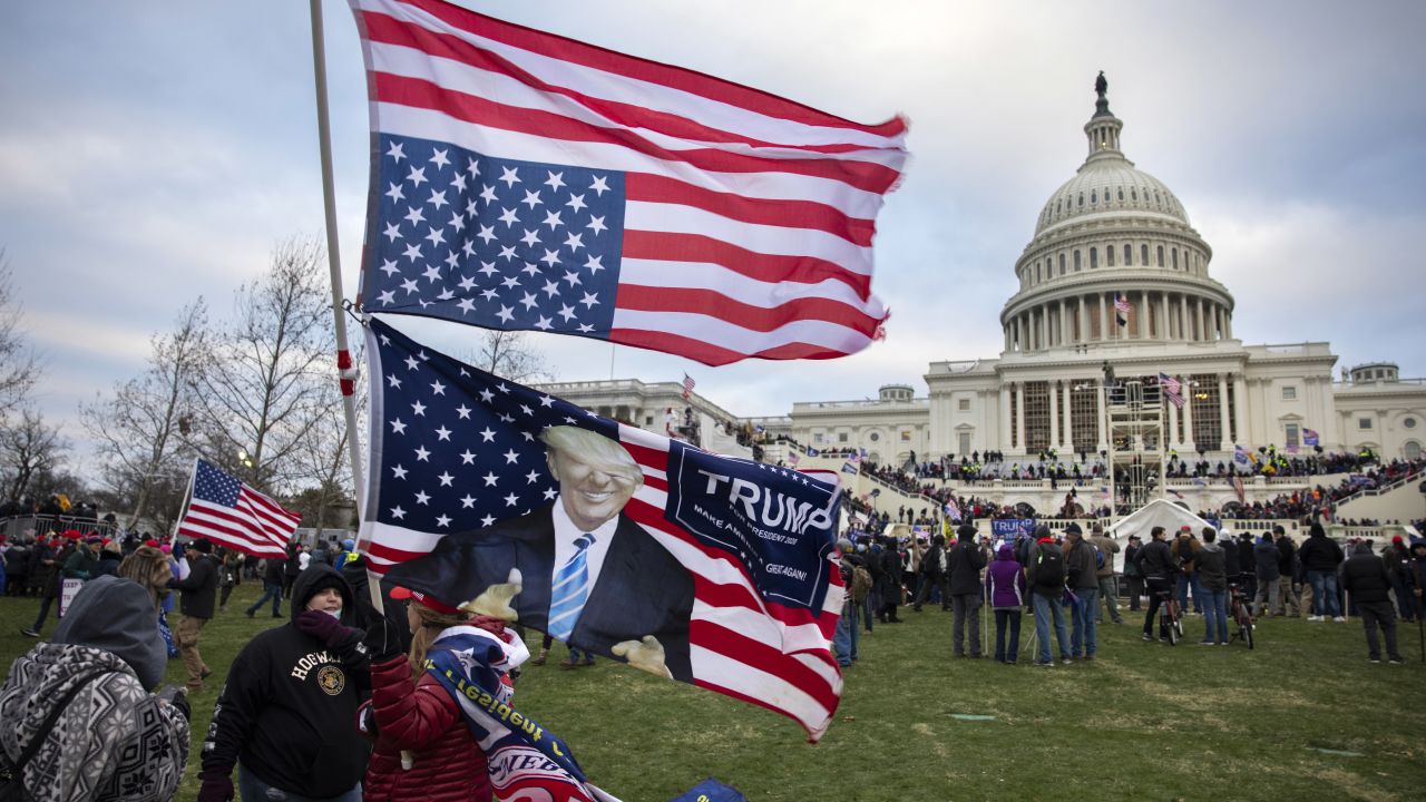 WASHINGTON, DC - JANUARY 06: Pro-Trump protesters gather in front of the U.S. Capitol Building on January 6, 2021 in Washington, DC. Trump ers gathered in the nation's capital to protest the ratification of President-elect Joe Biden's Electoral College victory over President Trump in the 2020 election. A pro-Trump mob later stormed the Capitol, breaking windows and clashing with police officers. Five people died as a result. (Photo by Brent Stirton/Getty Images)