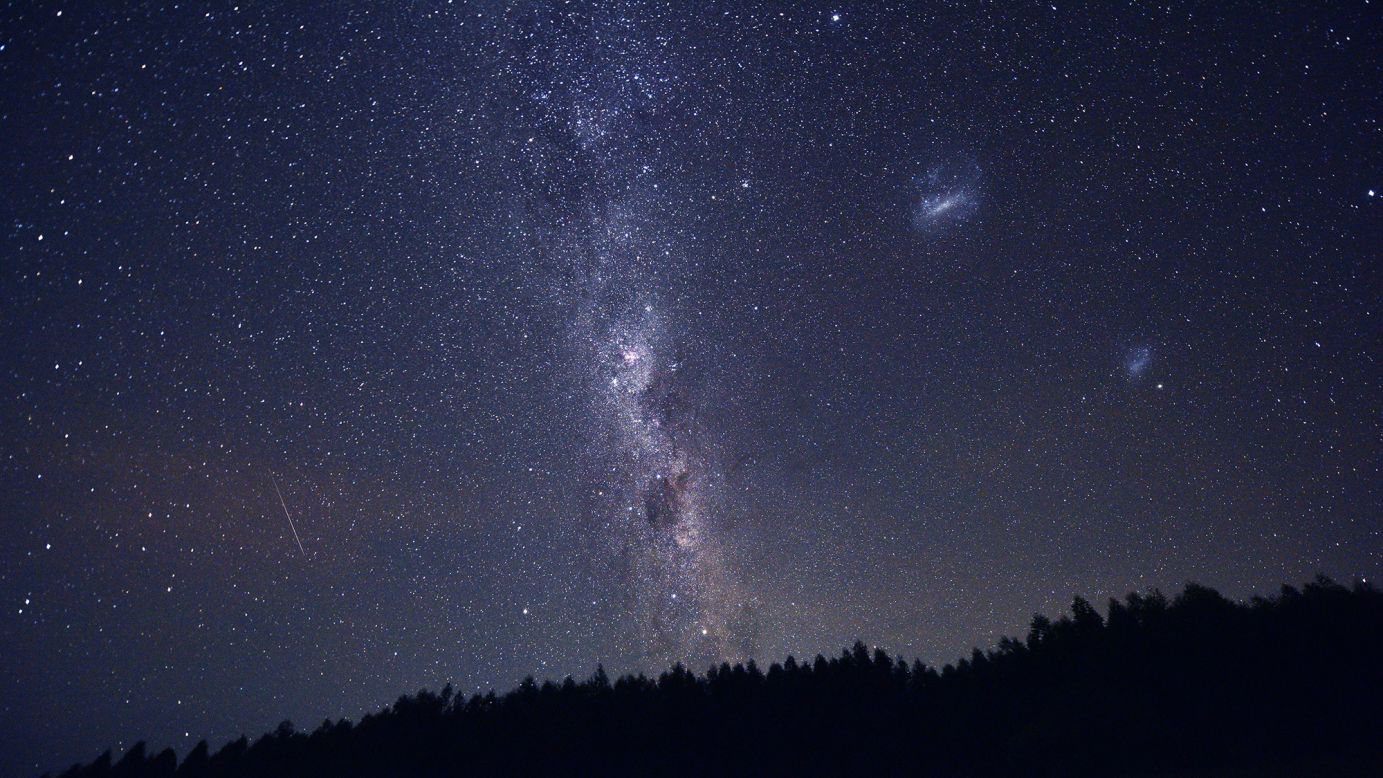 The Milky Way, seen here in the Uruguayan sky, has a mysterious glow at its center, which could be related to a hidden form of matter that physicists call dark matter.