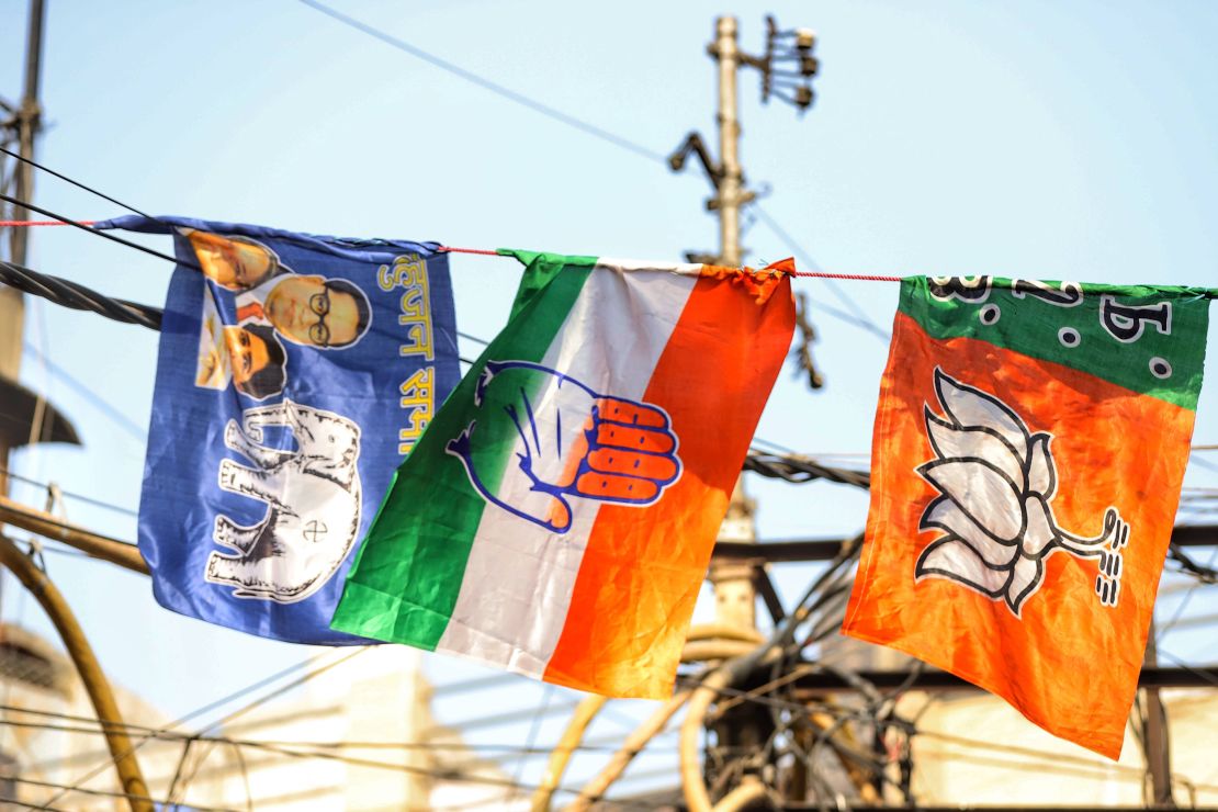 Bharatiya Janata Party (BJP), Indian National Congress (INC) and Bahujan Samaj Party (BSP) Flags are seen together at a Flag Printing market in Old Delhi, India on 27 March 2021. (Photo by Nasir Kachroo/NurPhoto via Getty Images)