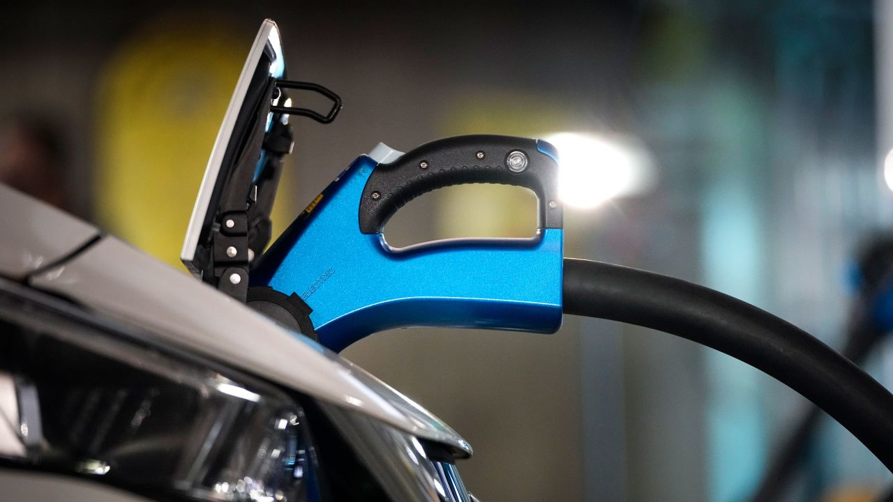 Electric vehicles are displayed before a news conference with White House Climate Adviser Gina McCarthy and US Secretary of Transportation Pete Buttigieg near Capitol Hill on April 22, 2021 in Washington, DC.