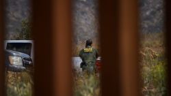 A US Border Patrol agent patrols new sections of the steel bollard-style border wall along the US-Mexico border between San Diego and Tijuana, during a tour with the US Customs and Border Protection on May 10, 2021, in the Otay Mesa area of San Diego County, California. - Few issues have as long a history of bedeviling both Democrats and Republicans as immigration and asylum on the approximately 2,000-mile (3,000-kilometer) US-Mexico frontier. (Photo by Patrick T. FALLON / AFP) (Photo by PATRICK T. FALLON/AFP via Getty Images)