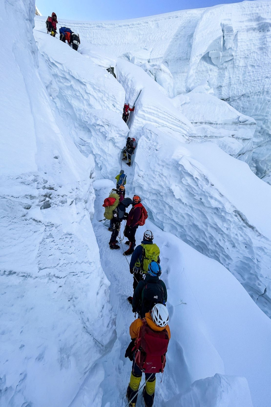 Mountaineers climbing during their ascend to summit Mount Everest on May 7, 2021.