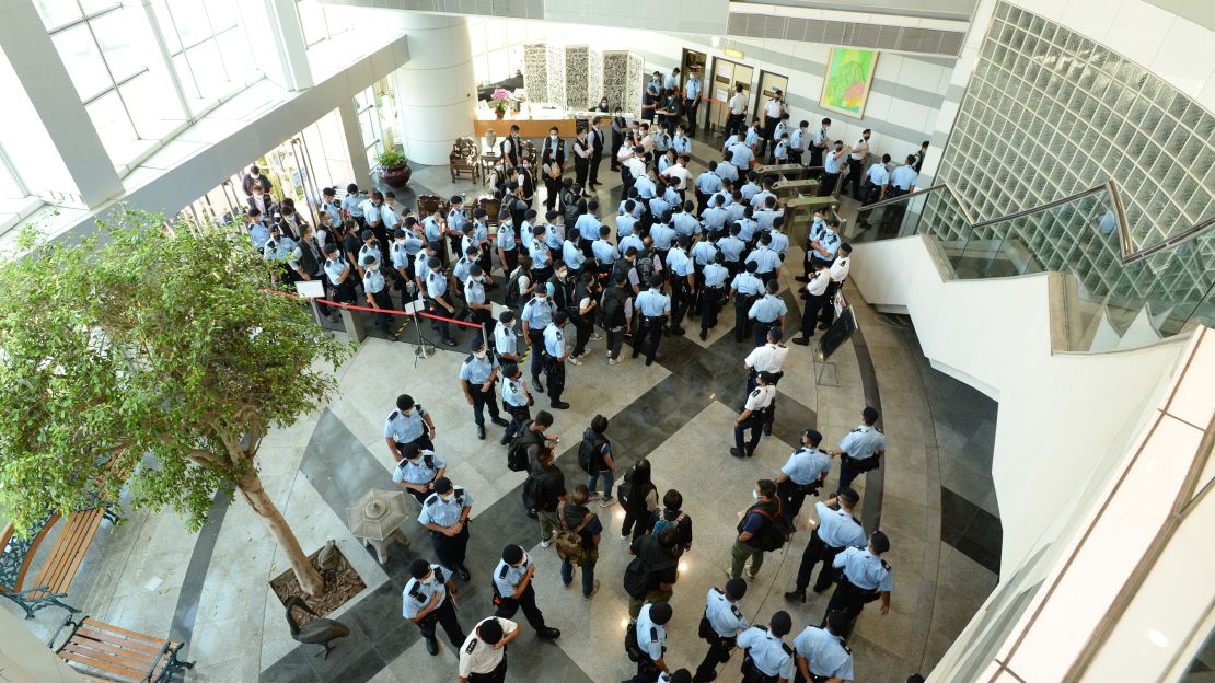 Police officers conduct a raid at the Apple Daily office on June 17, 2021 in Hong Kong