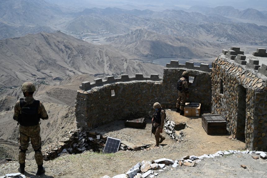 Pakistani troops patrol along Pakistan-Afghanistan border at Big Ben post in the Khyber district of the Khyber Pakhtunkhwa province on August 3, 2021.