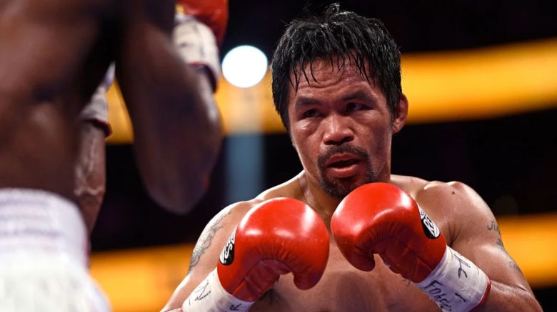 Manny Pacquiao lucha contra Yordenis Ugas en un combate por el Campeonato del Peso Wélter de la WBA en Las Vegas el 21 de agosto de 2021.