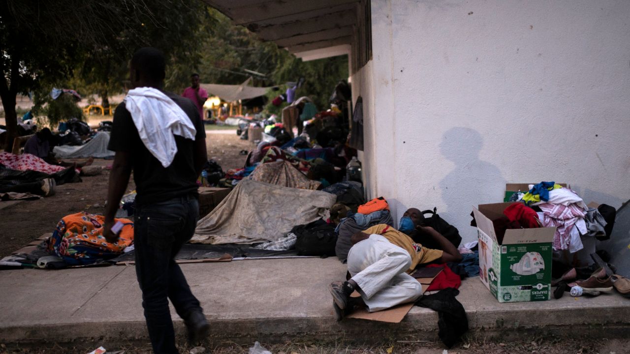 Haitian migrants are seen at a shelter in Ciudad Acuna, Coahuila state, Mexico, on September 22, 2021. - Clinging to ropes, some carrying children on their shoulders, Haitian migrants stranded at the US border cross the Rio Grande back into Mexico in search of food, water or medical treatment. (Photo by PEDRO PARDO / AFP) (Photo by PEDRO PARDO/AFP via Getty Images)