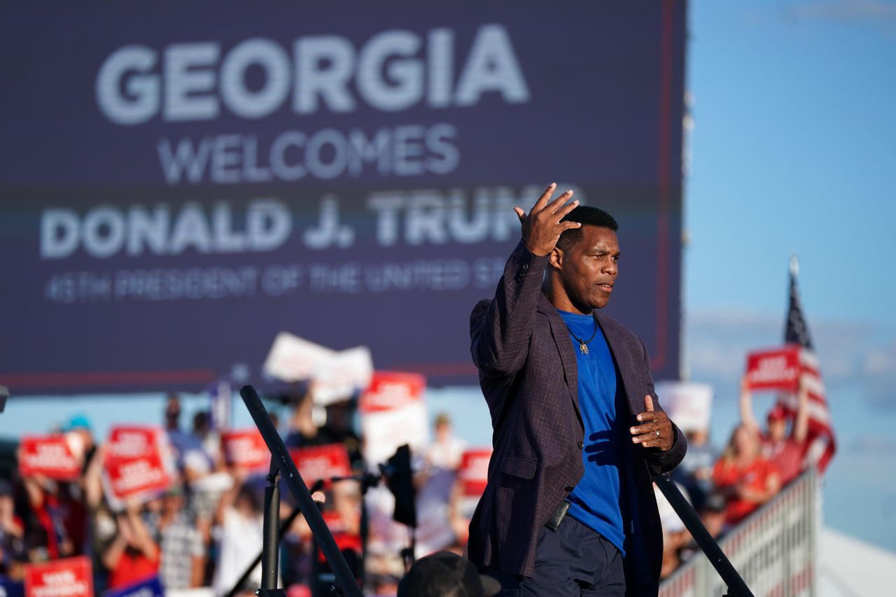 PERRY, GA - SEPTEMBER 25: Republican Senate candidate Herschel Walker walks off the stage during a rally featuring former US President Donald Trump on September 25, 2021 in Perry, Georgia. Georgia Secretary of State candidate Rep. Jody Hice (R-GA) and Georgia Lieutenant Gubernatorial candidate State Sen. Burt Jones (R-GA) also appeared as guests at the rally. (Photo by Sean Rayford/Getty Images)