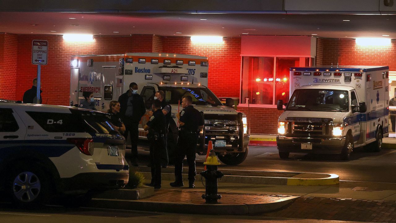 Boston, MA - October 7: Police gathered at the Boston Medical Center emergency entrance where a Brewster ambulance brought in the Brockton police officer who was injured in a shooting on October 7, 2021. (Photo by Barry Chin/The Boston Globe via Getty Images)